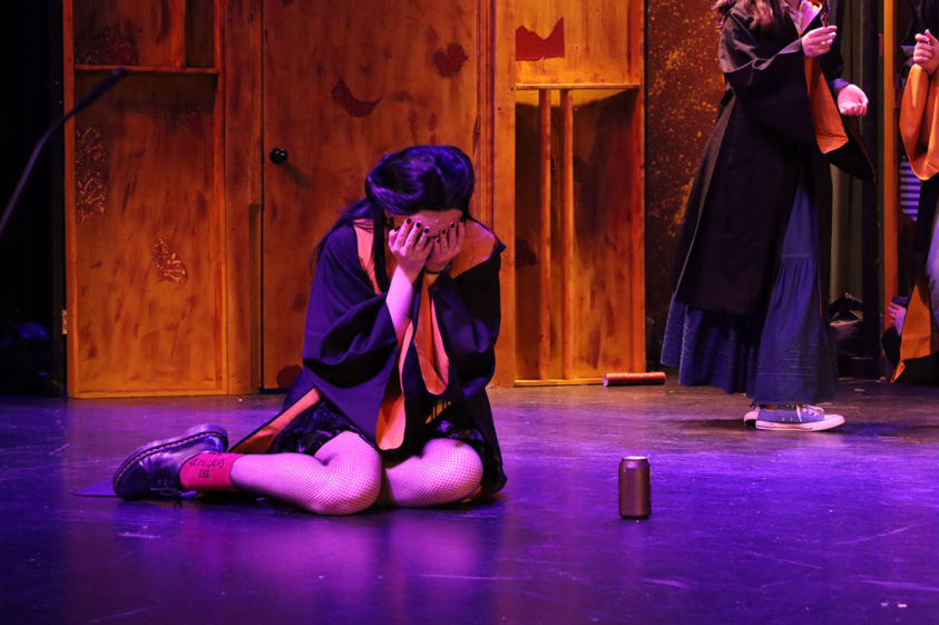 Witch Megan Jones, played by senior Addyson Laisch, cries thinking about her family. "Puffs" centered themes of belonging, friendship and found-family throughout the show's duration.