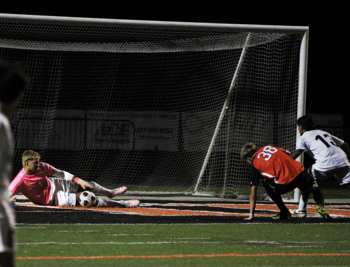 Goalie Brendan Valentin saves a shot on Jan. 19 against Oviedo. Valentin has a record of 113 saves, and he was signed to Daytona State College on Nov.13.