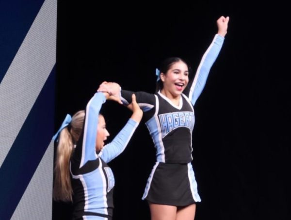 Sophomore Saydie Rivera and the competition cheer team competes at nationals on Feb. 7. The team took first at states and fourth in nationals.