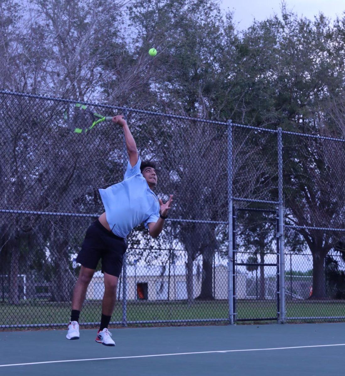 Line 3, Parth Goyal plays a singles match against Winter Springs in Feb.18. Goyal won his match 8-0 for singles and 8-2 for doubles.  Photo by Kaden De La Rosa.