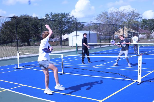 Senior Connor Stromberg hits the ball across the court. Pickleball's resurgence earned it it's own class for the '24-25 school year. 