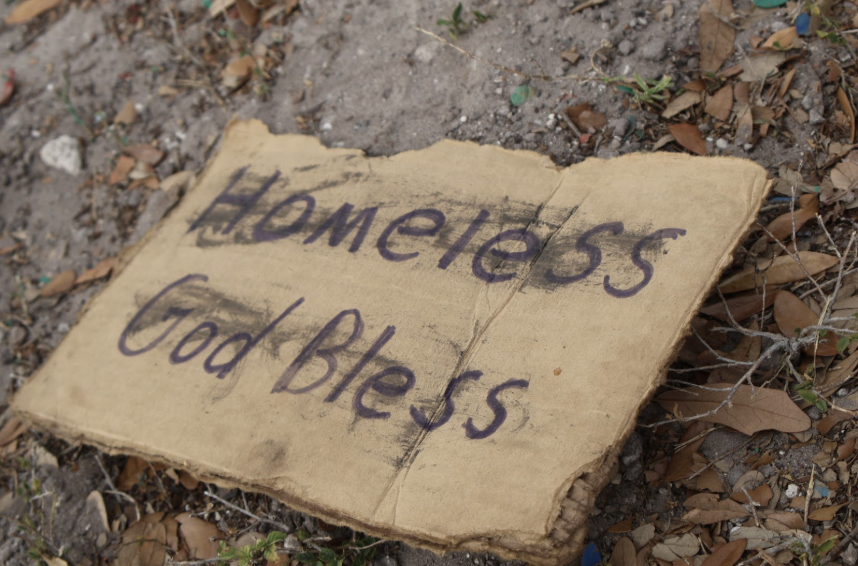A sign left by an unknown homeless person on East Colonial Drive, 4 miles from Hagerty.