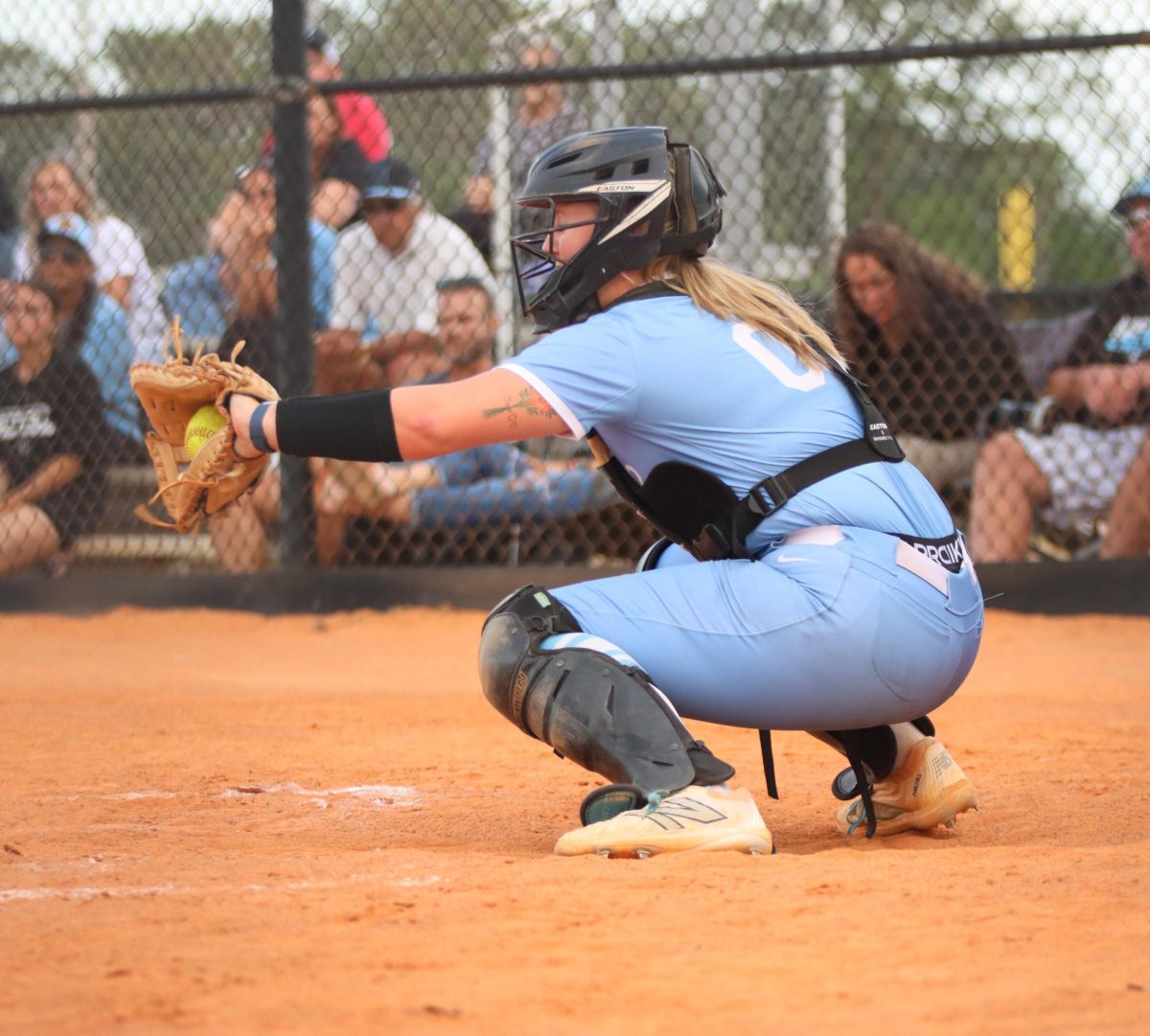 Senior Alexis Felker catches the ball. 