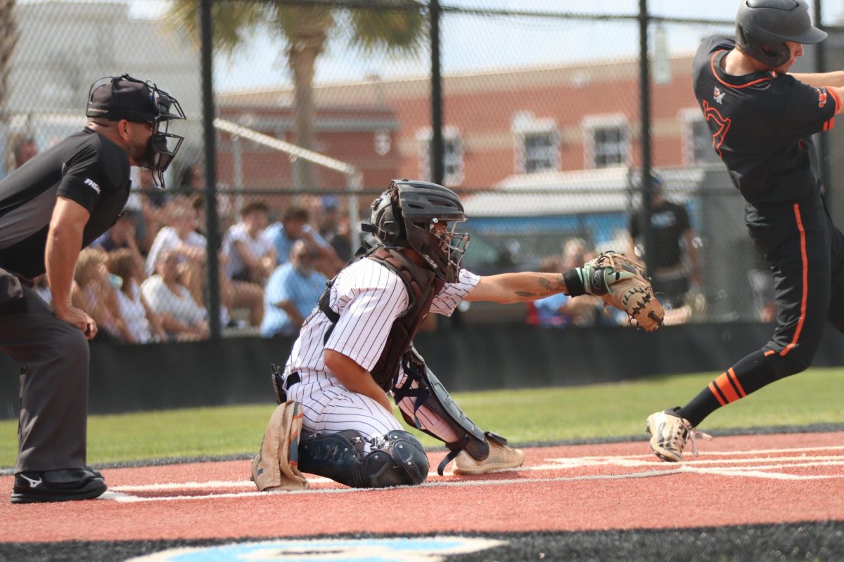A catcher catching the ball.
