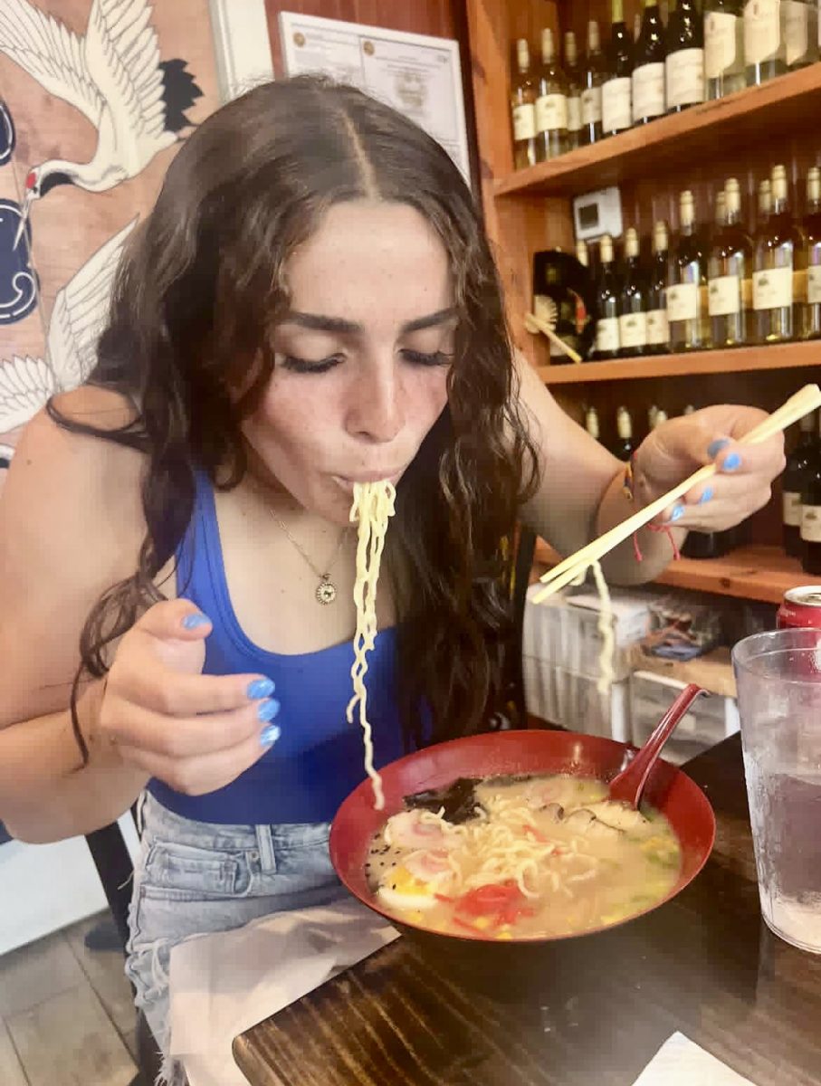Senior Ana Roman eats a bowl of Ramen as one of her content creations. Roman has 52k followers on TikTok. (Photo provided by Ana Roman.)