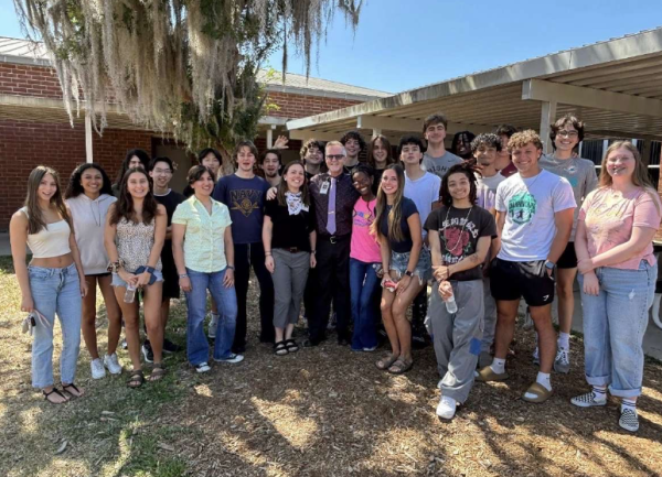 Former students of John Smith and Christine Jamrok gather for a group photo. Smith was mentioned as having a big impact by many students.