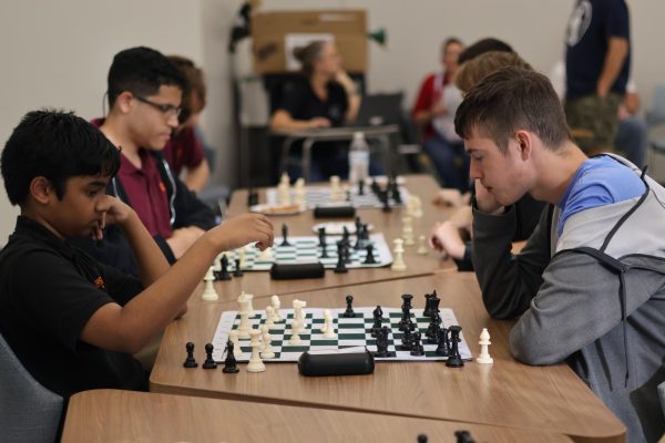 Sophomore Mathew Laniet playing chess during a Chess Club meeting. Chess club is one of the silver clubs on campus.
(Photo by Milo Myers)