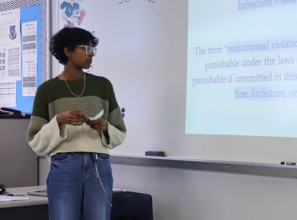 Legal Systems student Shreeya Rajakumar gives a presentation. Presentations are a key assignment in Legal Systems and Concepts.