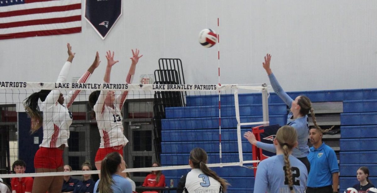 Senior Jenness Orcutt tipping the ball in the 3-1 loss.