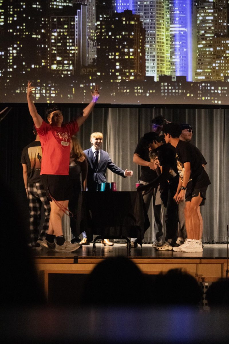 Senior class president Mitchell Richmond celebrates winner of The Tonight Toss. Students who won games received prizes. Photo | Bella Zimmerman