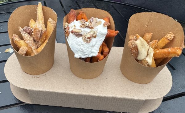 The Fry Flight from The Fry Basket. From left to right: fries with vinegar and salt, sweet potato fries with whipped cream and fries with truffles and black garlic aioli.
