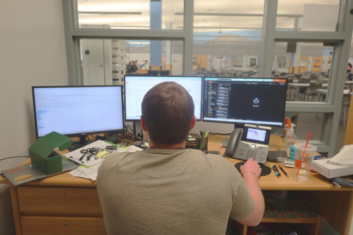 School IT Specialist Michael Siudak working. When Amazon Web Services went down many struggled to complete tasks that relied on them.