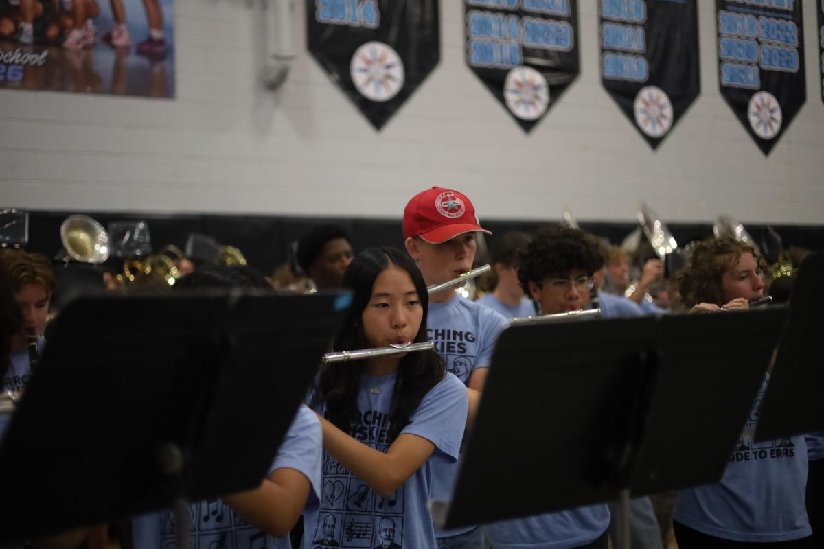 All State freshman Hannah Lee plays with the band during a pep rally. She along with 17 others marked the second most students accepted in the state.