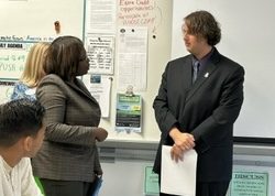 Graduate Antonio Pizza speaks with SCPS superintendent Serita Beamon. Pizza was a well-known personality on campus and held numerous leadership positions in clubs. (Photo provided by Antonio Pizza)