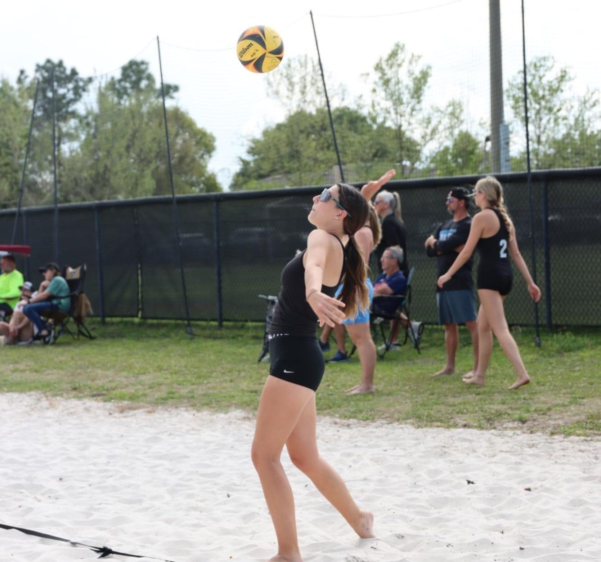 Senior Sophia Wattles prepares to strike the ball. The team beat Oviedo 5-0 March 25.