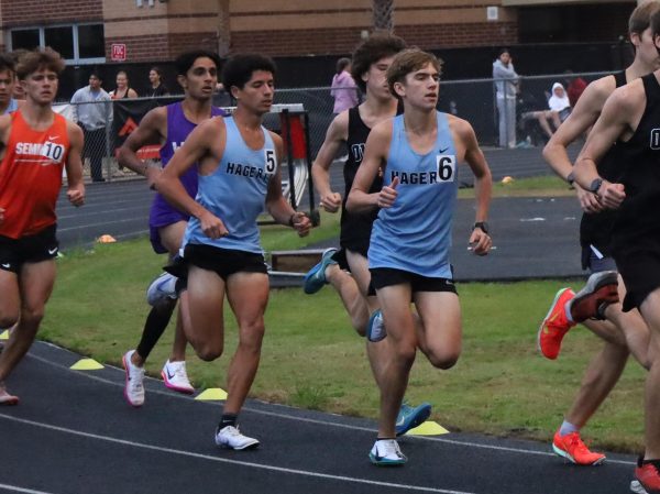Senior Ricardo Hernandez and sophomore Nate Winslow run the 1600m at the Seminole Athletic Conference. Hernandez and Winslow took fifth and seventh respectively in the race.