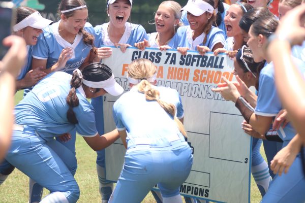 Celebration erupts as the team places its nameplate among the 7A State Champions. The girls sealed the title with a dominant postseason run.