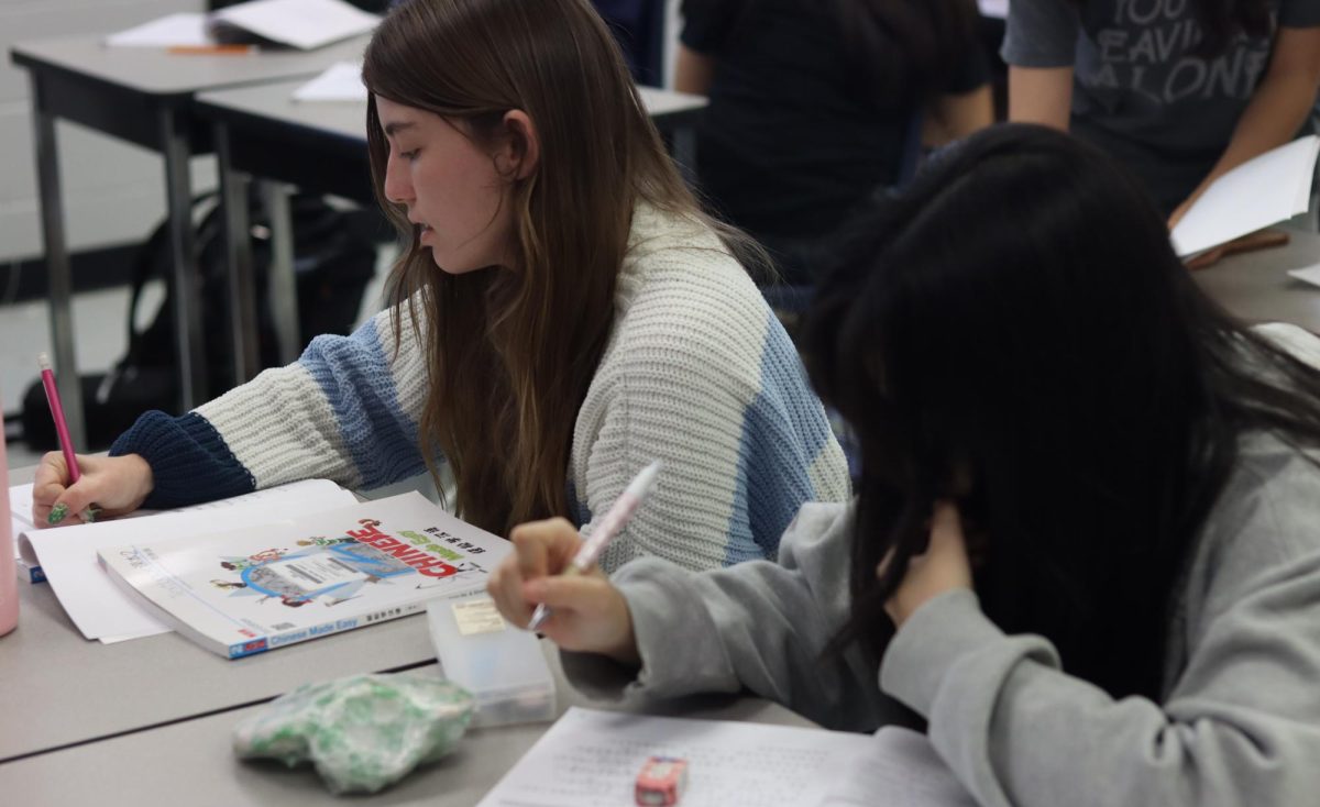 Senior Alyse May finishes her Chinese work as the school year comes to a close. Next year, no in-person Chinese classes will be offered.