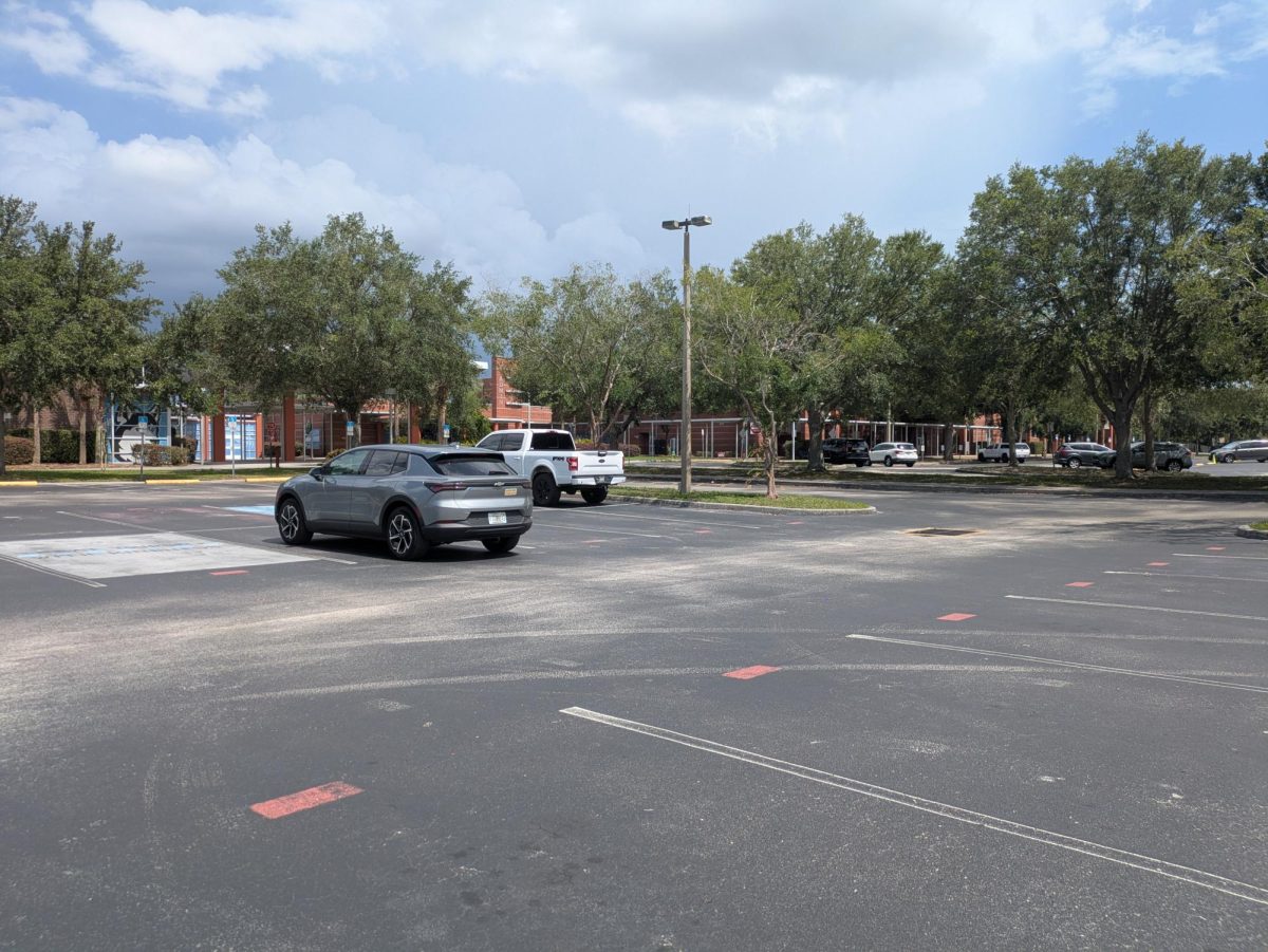 The student parking lot that sits almost empty by the end of the year.  It will soon be the center of a high-stakes competition. 